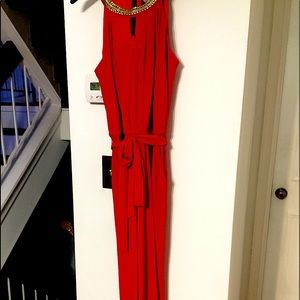 One piece jump suite; tie front wide leg